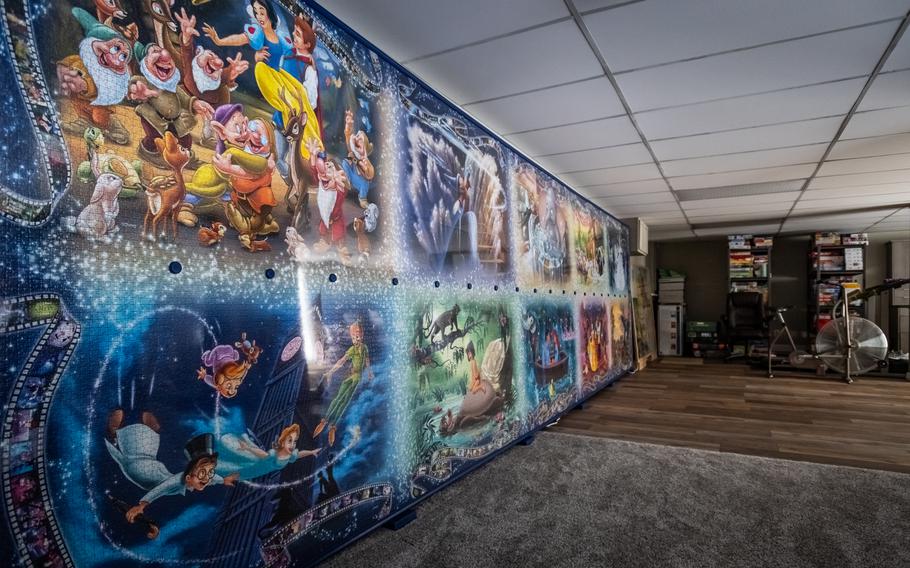 A 22-feet-long, 6½-feet-tall Disney puzzle spread across a wall in the Groskreutzes’ home.