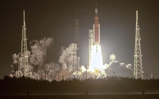 Artemis I, with the unmanned Orion spacecraft aboard, blasts off in November 2022. MUST CREDIT: Jonathan Newton/The Washington Post