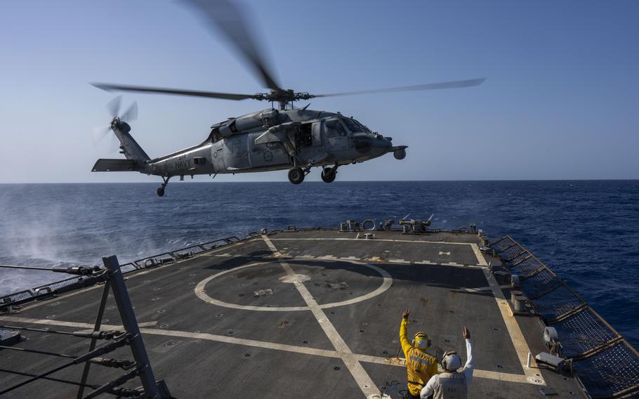 An HSC-7 helicopter lands on the Arleigh Burke-class guided missile destroyer USS Laboon in the Red Sea, Wednesday on June 12, 2024.