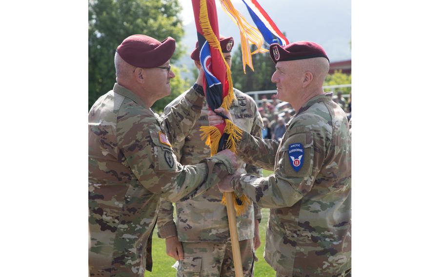 Maj. Gen. Brian Eifler, outgoing commander of 11th Airborne Division and the division’s new commander, Maj. Gen. Joseph Hilbert, at the change of command at Joint Base Elmendorf-Richardson, Alaska, on June 27, 2024. The change of command ceremony is the division’s first since its reactivation in June 2022.