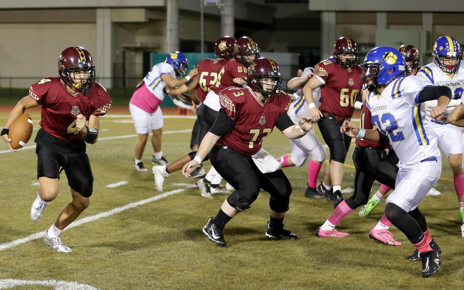 Jordan Burford runs with the ball.