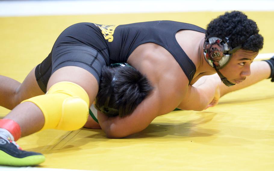 Josiah Drummer gets set for a pin.