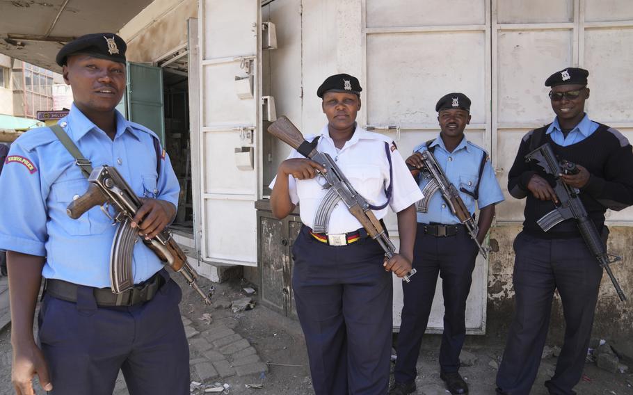 Kenya police patrol the streets of Nairobi, Kenya Tuesday, March 12, 2024. Hundreds of Kenyan police officers are leaving for Haiti, where they will lead a multinational force against powerful gangs. 