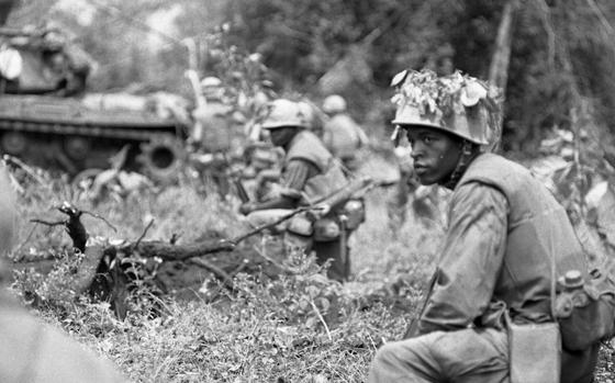 HED: On enemy lookout, 1967

Somewhere around Con Thien, Vietnam: A Marine scans the perimiter for any enemy activity. Marines launched another phase of Operation Prairie IV on May 13, 1967. On May 16, Alpha Company of the 1st Battalion, 9th Marines moved out on a platoon-sized sweep, supported by tanks.

Looking for Stars and Stripes’ coverage of the Vietnam War? Subscribe to Stars and Stripes’ historic newspaper archive! We have digitized our 1948-1999 European and Pacific editions, as well as several of our WWII editions and made them available online through https://starsandstripes.newspaperarchive.com/

META TAGS:Vietnam War; USMC; 1st Battalion 9th Marines; The Walking Dead; patrol; combat; war; servicemember; Infantry; tank;