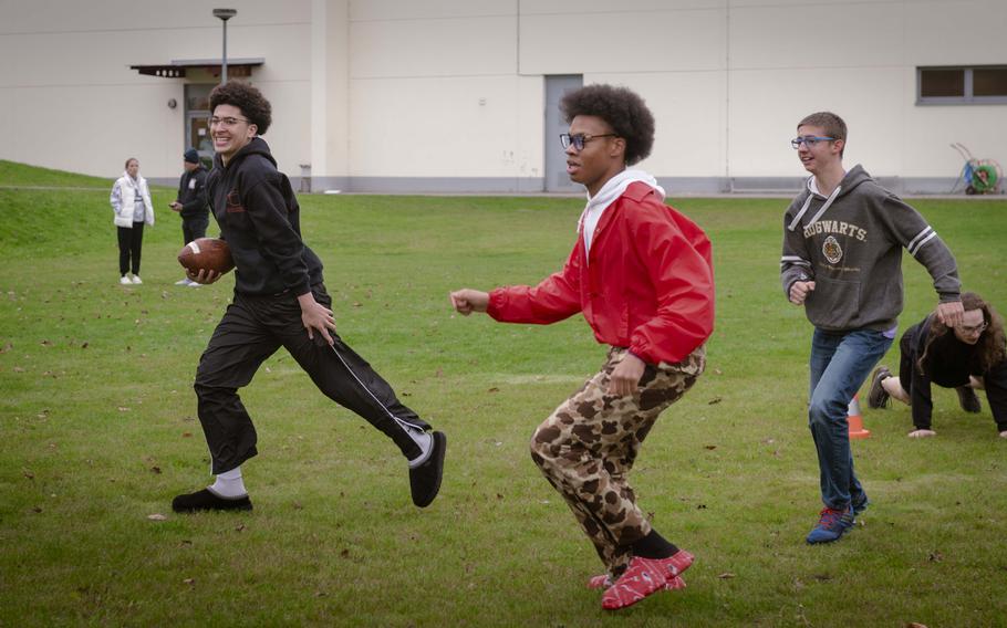 Vilseck High School students enjoy a quick football game with former New York Giants football players on Nov. 7, 2024. Victor Cruz and Brandon London visited students and talked about playing sports overseas, ahead of the Giants’ game against the Carolina Panthers in Munich on Sunday.