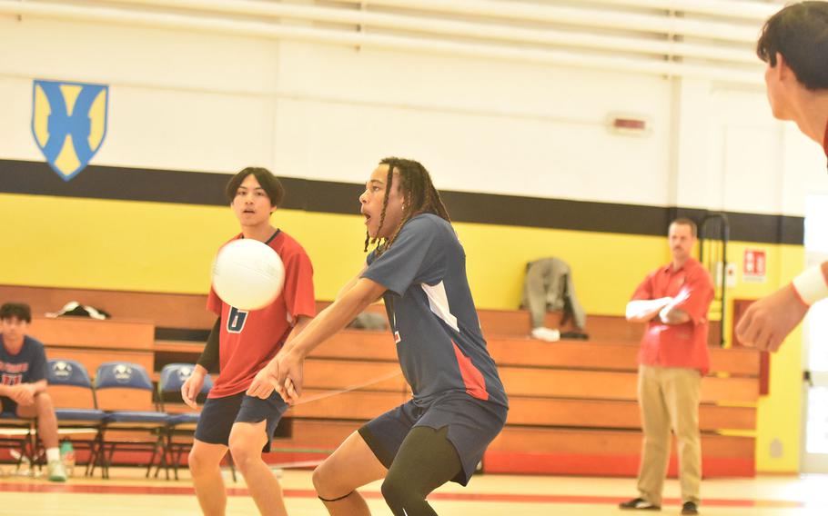 Andrew Walker bumps the ball.