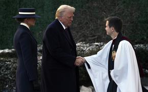 President-elect Donald Trump and his wife Melania are greeted as they arrive for church service at St. John's Episcopal Church across from the White House in Washington, Monday, Jan. 20, 2025, on Donald Trump's inauguration day. (AP Photo/Matt Rourke)