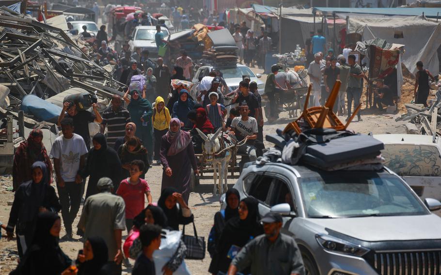 Palestinian civilians move away from the eastern districts of Khan Yunis in the southern Gaza Strip following evacuation orders by the Israeli army on July 22, 2024.