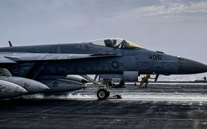 An F/A-18 Super Hornet prepares to launch from the deck of the aircraft carrier USS Dwight D. Eisenhower in the Red Sea on March 19, 2024.