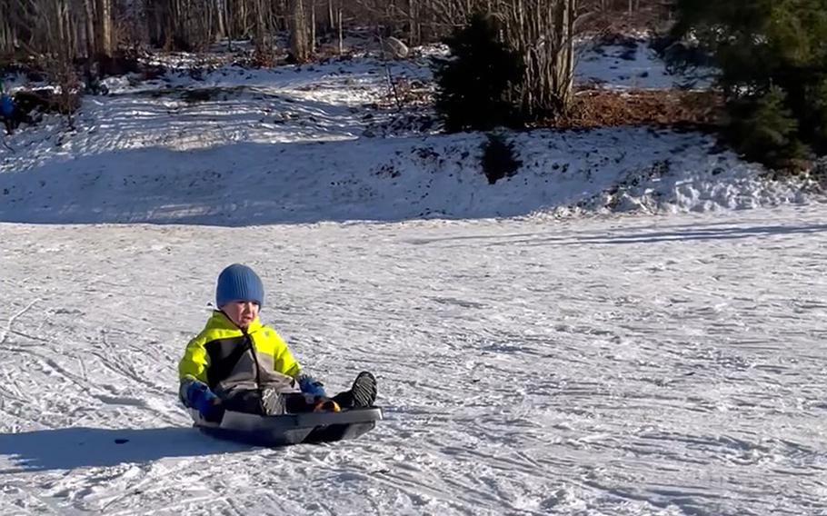 Ezra Erickson, 6, goes sledding in Piancavallo, Italy, a mountain resort area about a 30-minute drive from Aviano Air Base.