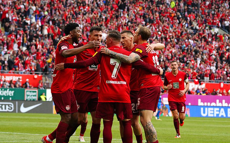 1. FC Kaiserslautern players celebrate their 5-0 win Sunday.