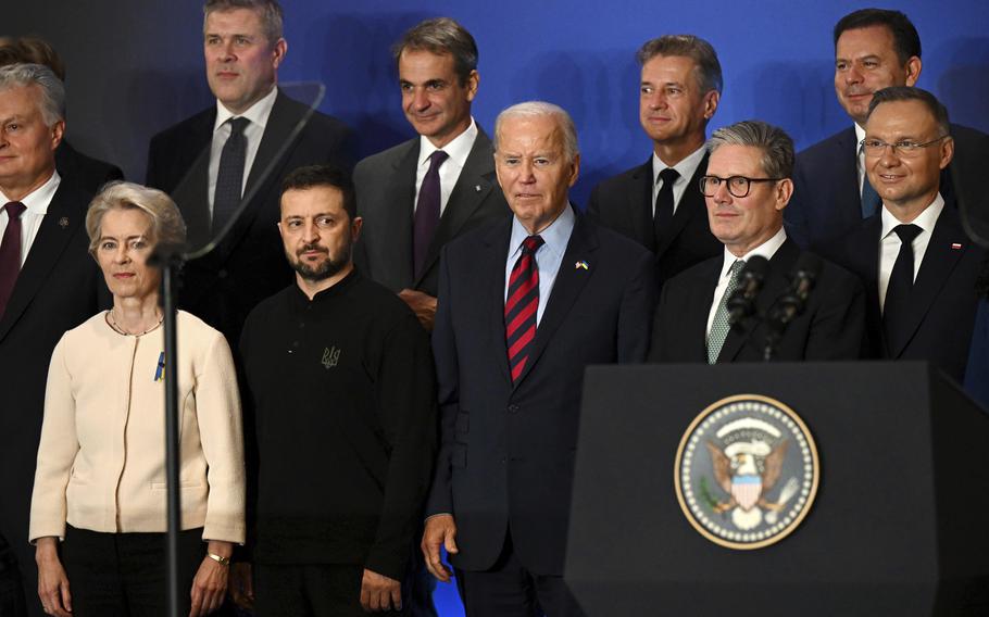 U.S. President Joe Biden, center, with Ukraine’s President Volodymyr Zelenskyy, front second left, President of the European Commission Ursula von der Leyen, front left, Britain’s Prime Minister Keir Starmer, front second right, President of Poland Andrzej Duda, right, and other world leaders pose for a family picture of the launching of a Joint Declaration of Support for Ukrainian Recovery and Reconstruction, on Sept. 25, 2024, in New York. 