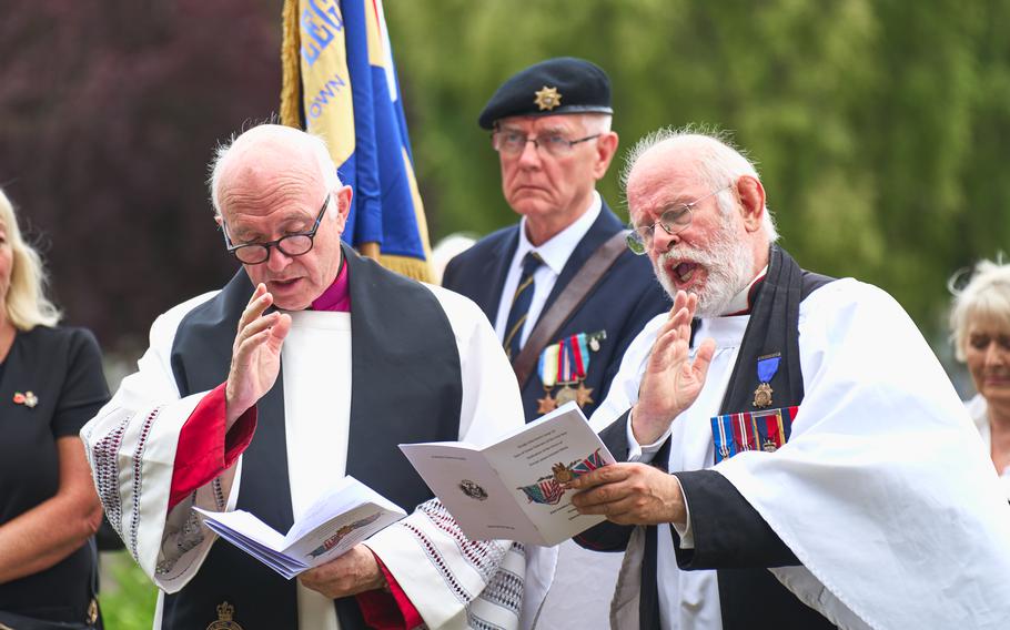 Chaplains give a closing prayer during the ceremony for Union Civil War veteran Pvt. James Schobel White at the East London Cemetery in England, Aug. 10, 2024. 