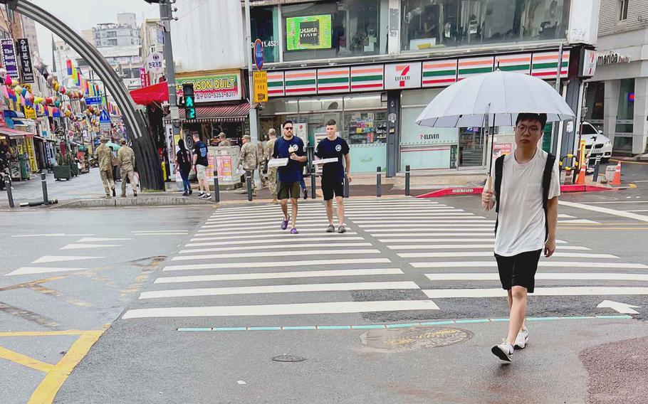 The shopping street outside the main gate at Osan Air Base, South Korea, resumed its after-storm routine on Aug. 11, 2023.