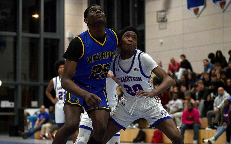 Joel Idowu and Amari Guishard battle for position.