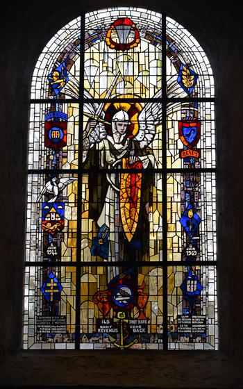 This stained-glass window in the Sainte-Mère-Église church showing St. Michael, patron saint of parachutists, was donated by veterans of the 82nd Airborne Division for the 25th anniversary of D-Day.