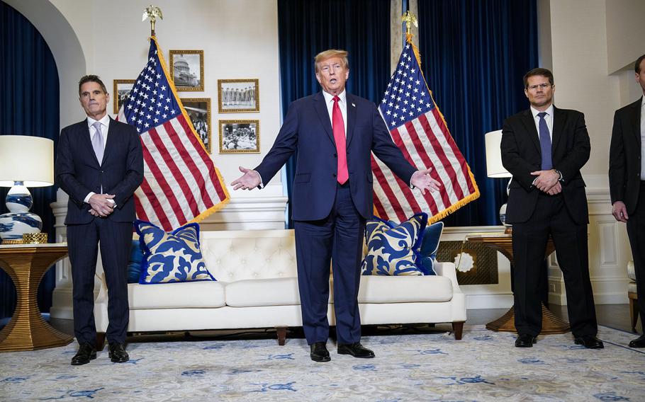 Former president Donald Trump speaks to the media at the Waldorf Astoria following his appearance in U.S. District Court in D.C. on Tuesday. 