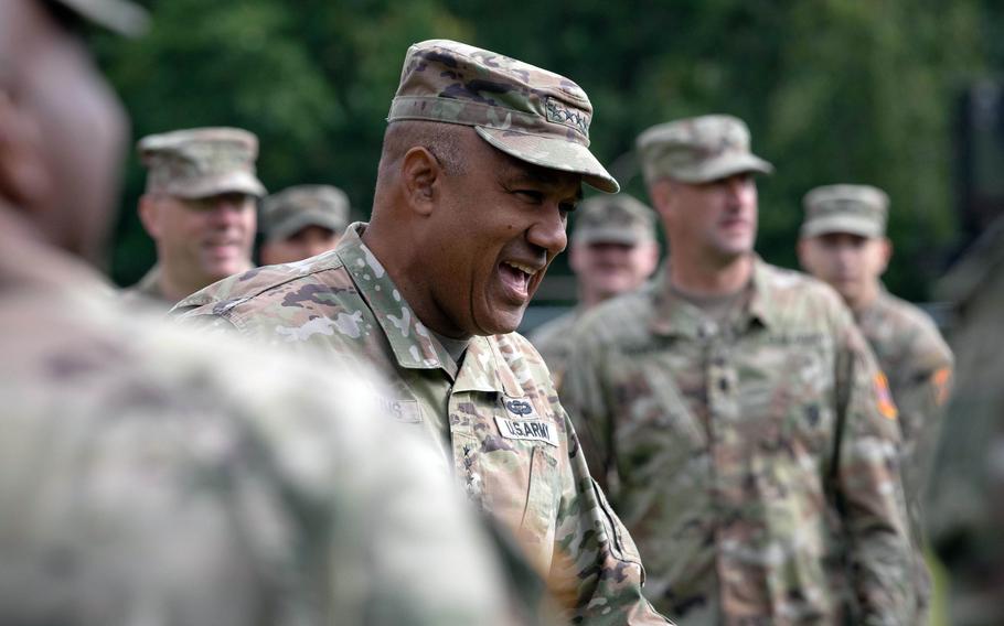 Commander of United States Europe and Africa, Gen. Darryl A. Williams, jokes with troops at Sembach Kaserne, Germany, Thursday, June 20, 2024, ahead of a change-of-command ceremony for the 10th Army Air and Missile Defense Command.