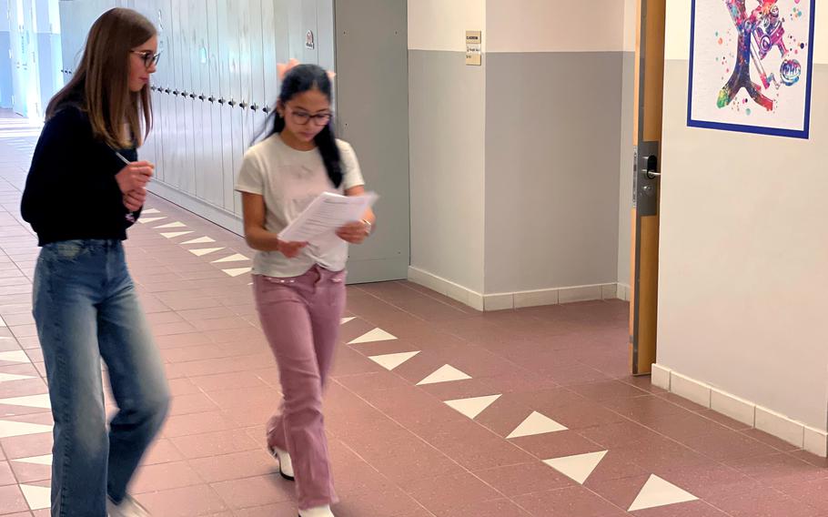 Two students walk through a DODEA-Europe school.