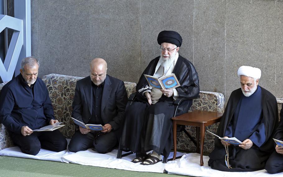 Supreme Leader Ayatollah Ali Khamenei, second right, Judiciary Chief Gholam Hossein Mohseni Ejehei, right, Parliament Speaker Mohammad Bagher Qalibaf, second left, and President Masoud Pezeshkian read Quran in a ceremony commemorating slain Hezbollah leader Hassan Nasrallah, at Imam Khomeini grand mosque in Tehran, Iran.