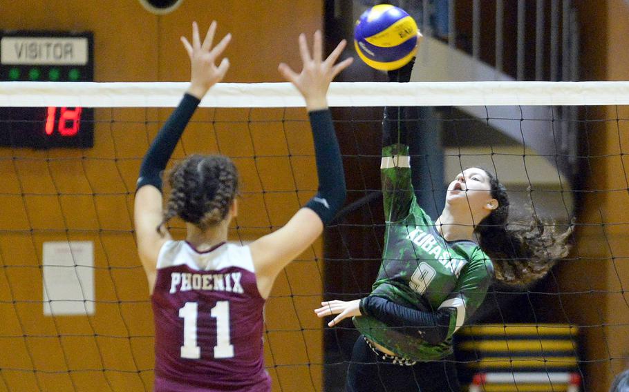 Kubasaki's Olivia Schaffeld spikes against Seisen International's Pipi Hill during Thursday's American School In Japan YUJO tournament match. The Dragons won the rematch of last year's final in three sets.