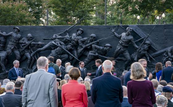 The centerpiece of the National World War I Memorial in Washington, “A Soldier’s Journey,” is unveiled on Friday. MUST CREDIT: Allison Robbert for The Washington Post