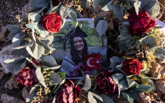 A memorial for Aysenur Eygi at the olive grove where activists say she was shot dead in the West Bank village of Beita. MUST CREDIT: Heidi Levine for The Washington Post