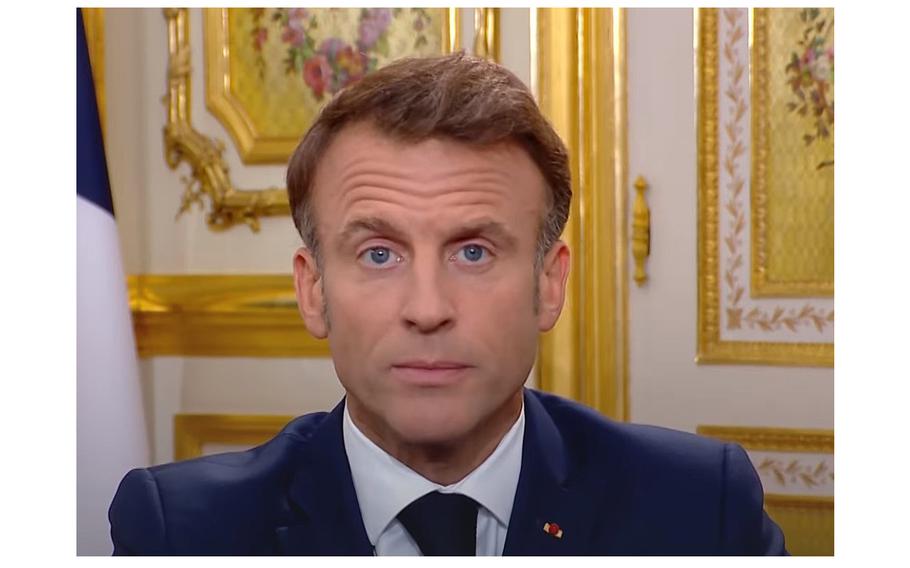 A video screen grab shows French President Emmanuel Macron urging the populace not to give in to any form of hatred.