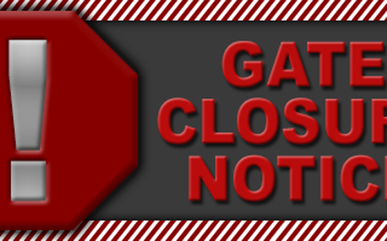 An exclamation point within a red octagon next to the words “gate closure notice” in red text.