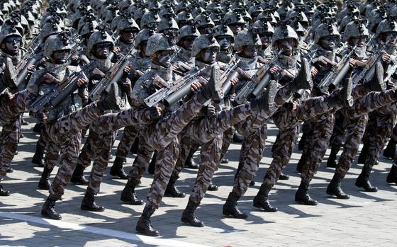 FILE - Soldiers march in a parade for the 70th anniversary of North Korea's founding day in Pyongyang, North Korea, on Sept. 9, 2018. (AP Photo/Ng Han Guan, File)