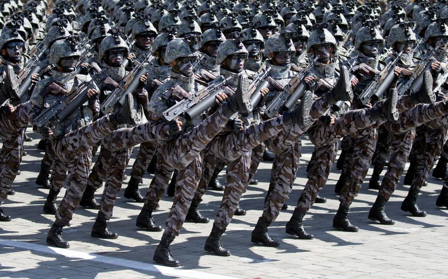 Soldiers march in a parade for the 70th anniversary of North Korea’s founding day.