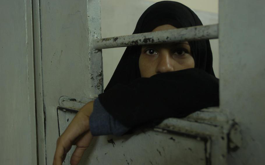 Iraqi prisoner waits in the Karbala jail 