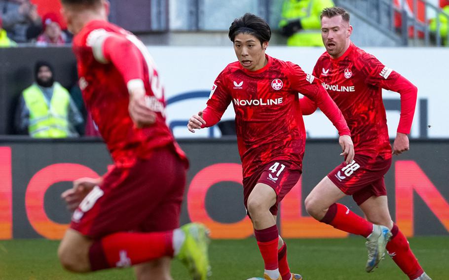 The Red Devils, with Daisuke Yokota, center, lost 1-0 at home against Cologne in the last game of the year.