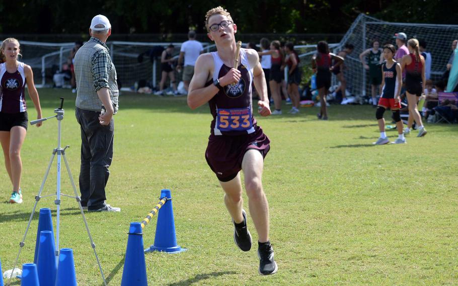 Xavier Mitchell runs in cross country.