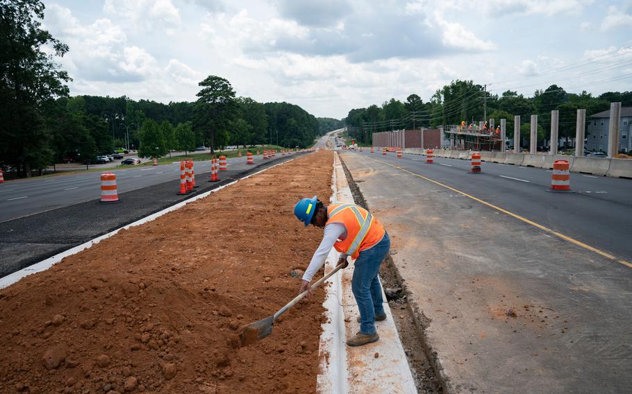 Construction is underway along a road in Raleigh, N.C.