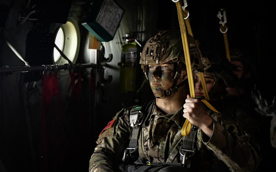 Sgt. Kaity Andersen gets set to jump out of a C-130 Hercules