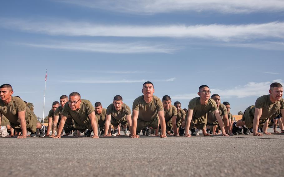 New U.S. Marines do push-ups in formation