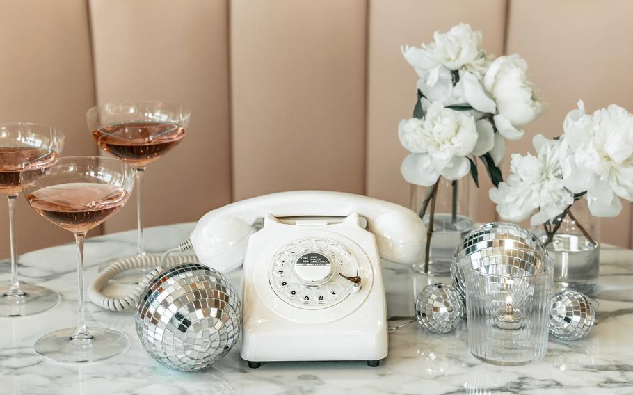 An audio wedding guest book offered for rent by FêteFone. The bridal market is crowded with companies renting or selling vintage phones for guests to record their well wishes. 