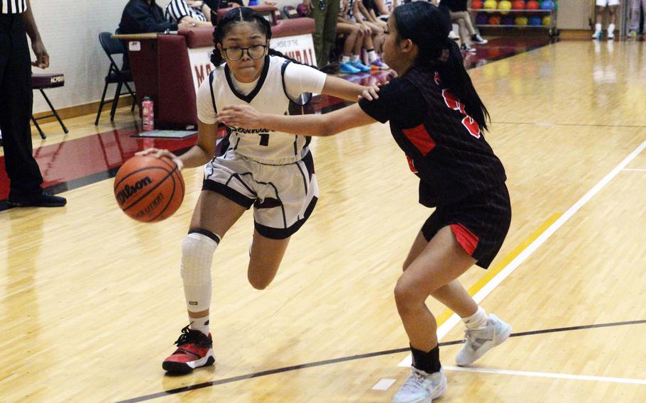 Elieza Cuaco drives to the basket.