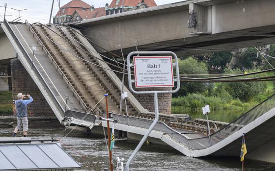 Parts of the Carola Bridge over the Elbe have collapsed in Dresden, Germany, Wednesday, Sept. 11, 2024.