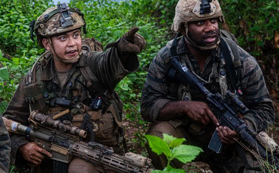U.S. Army Sgt. Ratu Komaisavai, a sniper assigned to the 100th Infantry Battalion, roleplaying as opposing forces (OPFOR), directs U.S. Army Spc. Lavarias Kawika, an infantryman assigned to the 100th Infantry Battalion, also roleplaying as OPFOR,  towards simulated enemy fire during an engagement as part of the Joint Pacific Multinational Readiness Center-Exportable (JPMRC-X) exercise at Fort Magsaysay, Philippines, June 7, 2024. This iteration of JPMRC-X marks the first deployment to the Philippines, which will enable and assist the Philippine Army and the Armed Forces of the Philippines in building combat training center locations within the Philippines.



The JPMRC-X is a Department of the Army initiative consisting of a deployable package of personnel and equipment designed to support training exercises across the Pacific. (U.S. Army National Guard photo by Staff Sgt. Thomas Moeger)