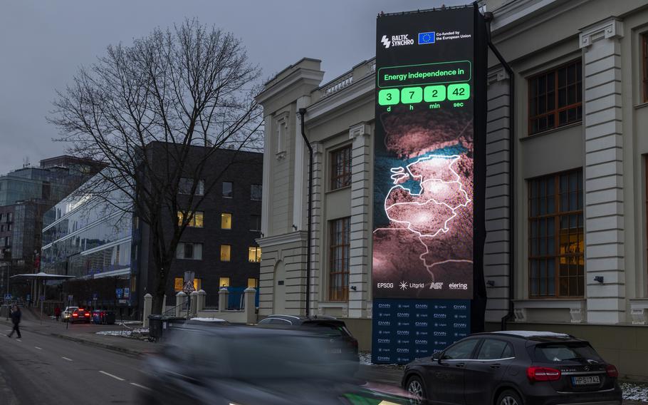 A screen near the Energy Museum and Mindaugas Bridge indicates that on February 8 the Baltic States will disconnect from the Russian electricity grid to synchronize with Continental Europe, in Vilnius, Lithuania, Tuesday, Feb. 4, 2025. 