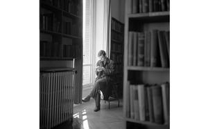 HED: Quiet solitude with a book, 1960

Paris, France, July 16, 1960: A patron sits on a stepstool by one of the large windows in the American Library in Paris, daylight illuminating the selection he pulled from the stacks next to him. Established in 1920 with a core collection of books and magazines donated by American libraries to the American Expeditionary Forces serving in Europe during World War I, the library is still in operation today and is the largest English-language lending library on the European continent. 

In Paris over the holidays and looking to visit the library? Check out its opening hours and historic tours here. https://americanlibraryinparis.org/tours/

For more things to do in the City of Lights check out Stars and Stripes Europe's article on what's happening in Paris this winter.

META TAGS: Travel; France; American culture; library; books; travel tips; weekend getaways