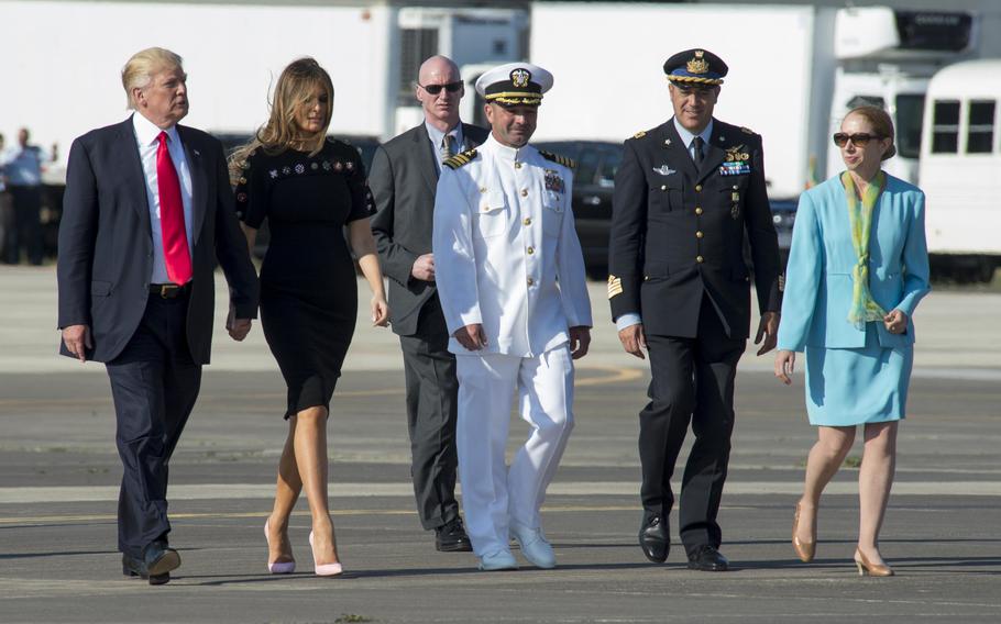 Capt. Brent Trickel, center, Italian Col. Federico Fedele and Kelly Degnan, the charge d’affaires at the U.S. Embassy in Rome, escort President Donald Trump and first lady Melania Trump to Air Force One after a visit to NAS Sigonella in May 2017.