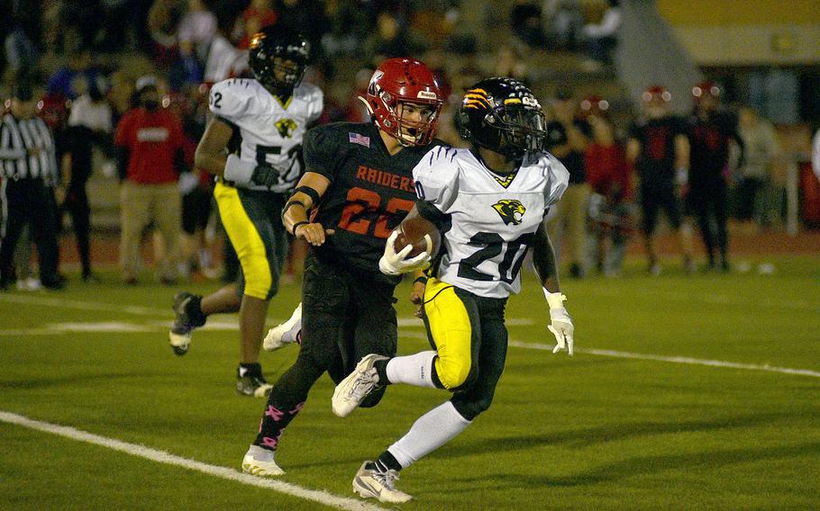 M.J. Watkins turns the corner.