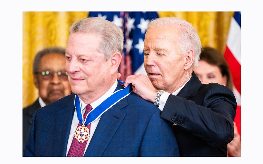 Former vice president Al Gore receives the Presidential Medal of Freedom from President Joe Biden on Friday, May 3, 2024.