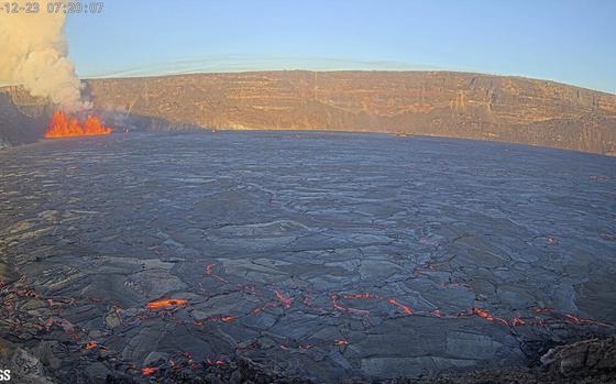 In this aerial photo provided by the U.S. Geological Survey, an eruption takes place on the summit of the Kilauea volcano in Hawaii, Monday, Dec. 23, 2024. (U.S. Geological Survey via AP)