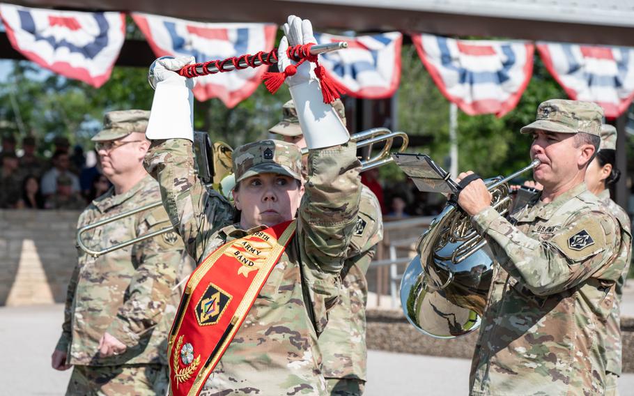 Drum Major 1st Sgt. Jennifer Champagne, front center, leads the 399th Army Band during a change-of-command ceremony for 169th Engineer Battalion on Aug. 9, 2024, at Fort Leonard Wood, Mo.