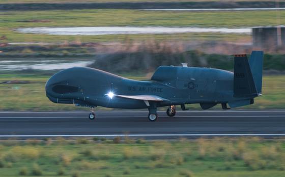 An RQ-4 Global Hawk speeds down the runway for takeoff Oct. 24, 2018, at Naval Air Station Sigonella, Italy. An RQ-4 landed in England this week for temporary deployment, following a nearly 24-hour flight from Italy.