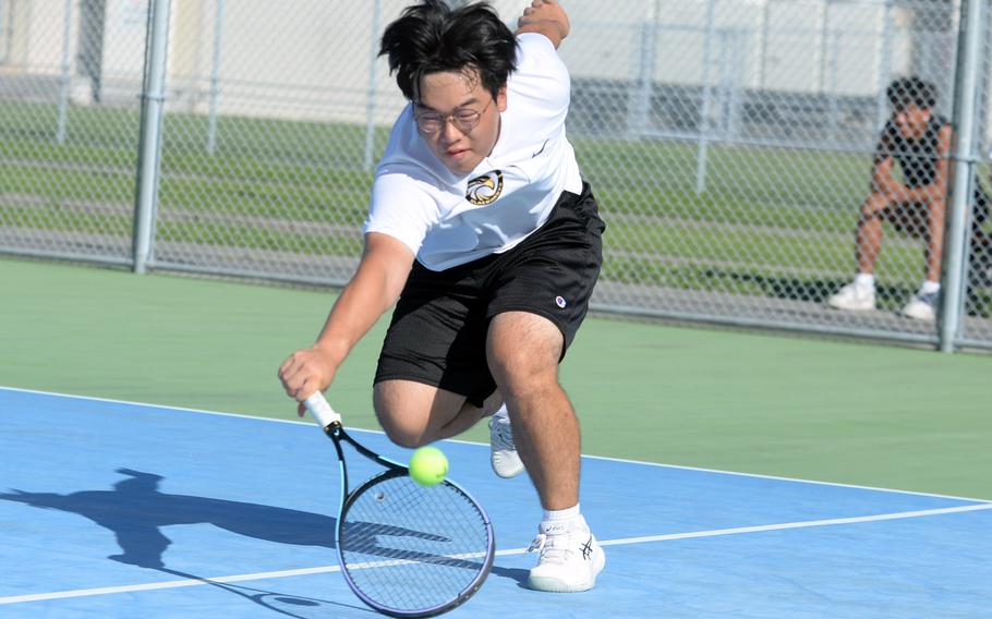 Elliott Lee hits the ball.